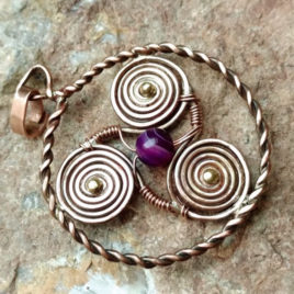 Copper triskelion necklace, purple agate