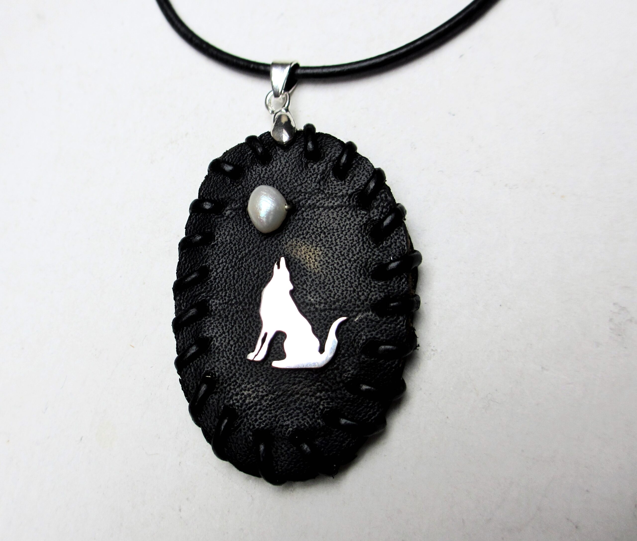 Howling wolf moon necklace sterling silver, genuine pearl, on 1,5 mm thick leather cord
