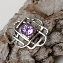 Celtic knot aka Star of Svarog charm with amethyst