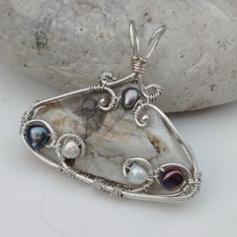 Large triangle belomorite pendant, silver wire, white and peacock pearls