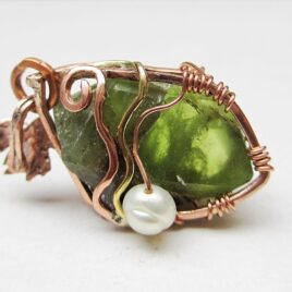 Raw peridot crystal pendant copper wire wrapped, with a green genuine freshwater pearl